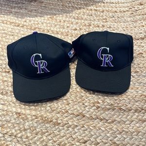 Two Colorado Rockies youth baseball hats